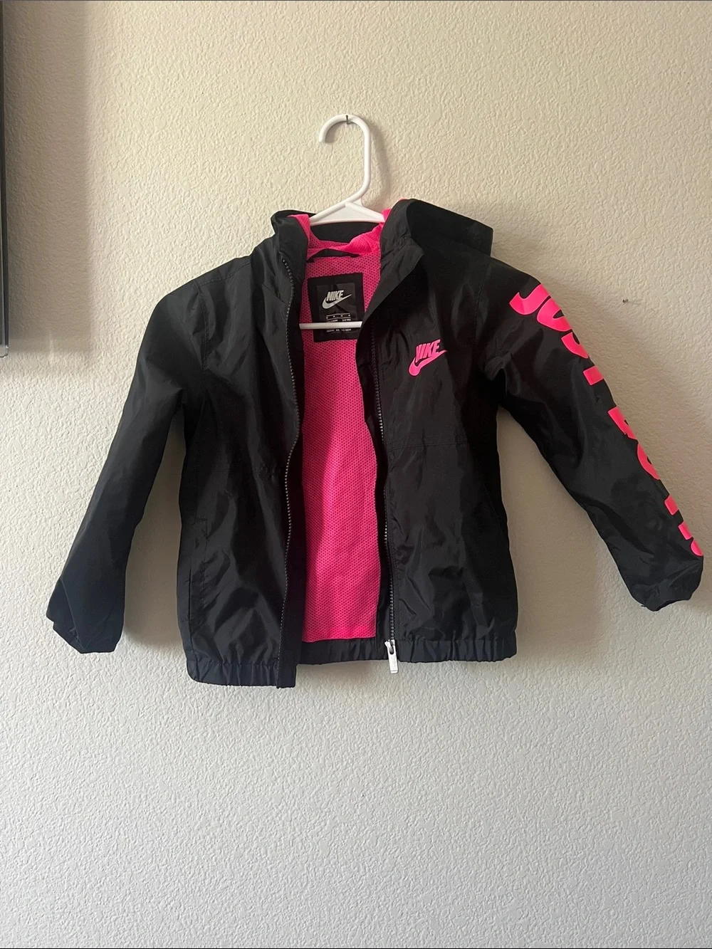 Nike Black Jacket with Bright Pink Lining and Logos